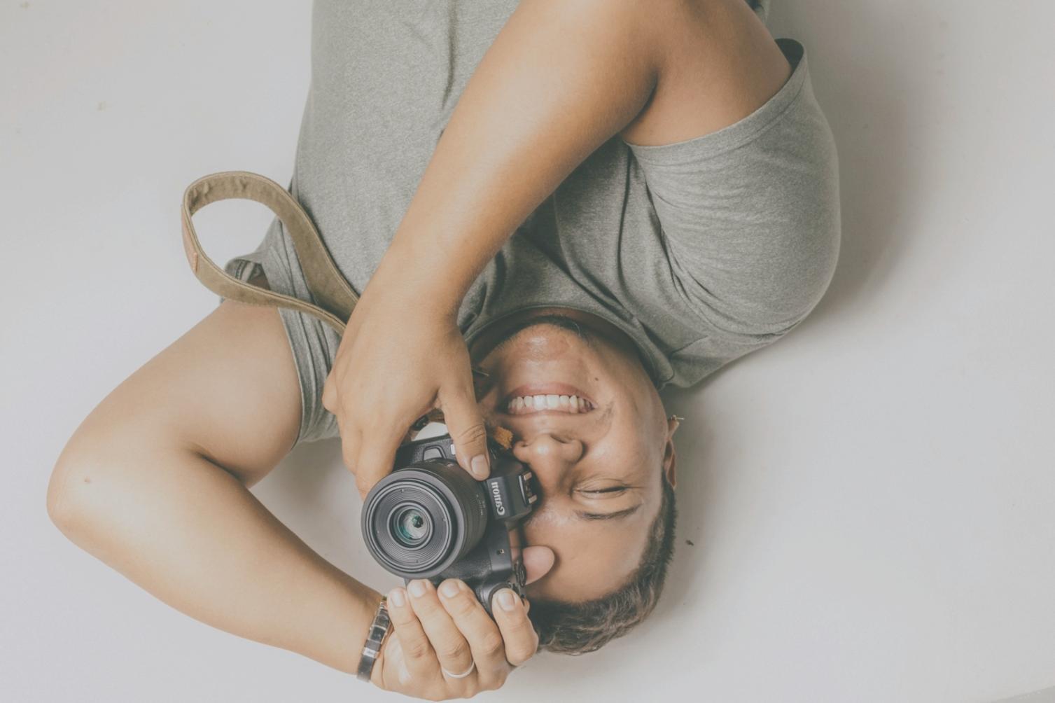 Video editing workspace showing multiple monitors and professional equipment